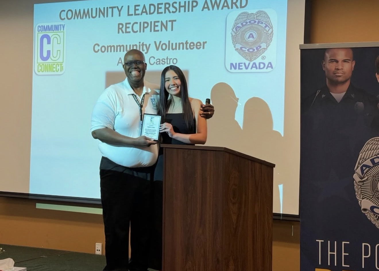 Aiyana Castro receiving the Community Leadership Award from Community Connect and Adopt-A-Cop Nevada