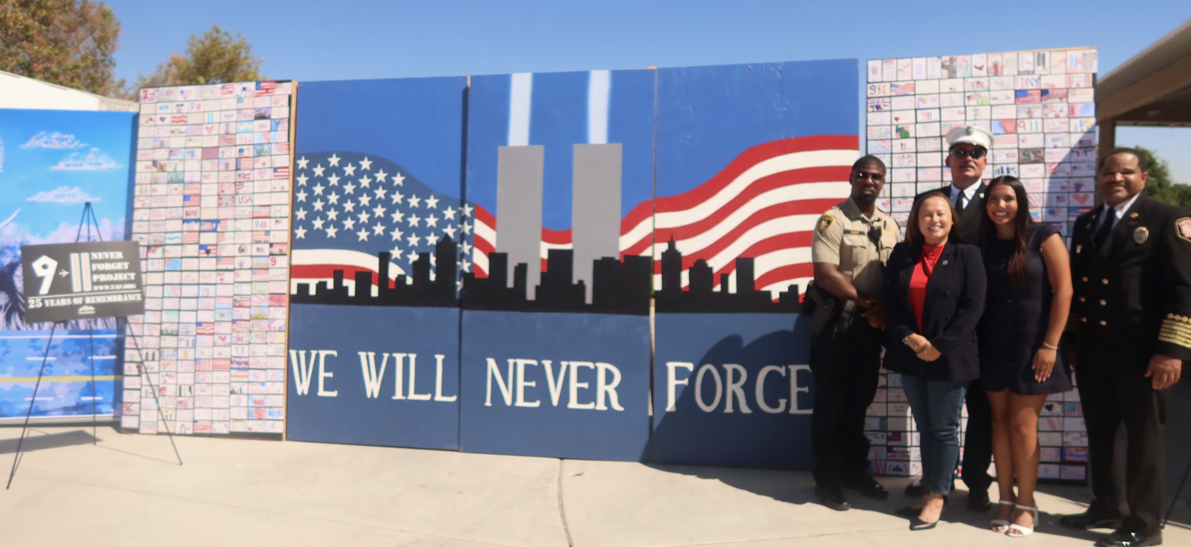 Guests reading CCSD student messages on the Remembrance Wall