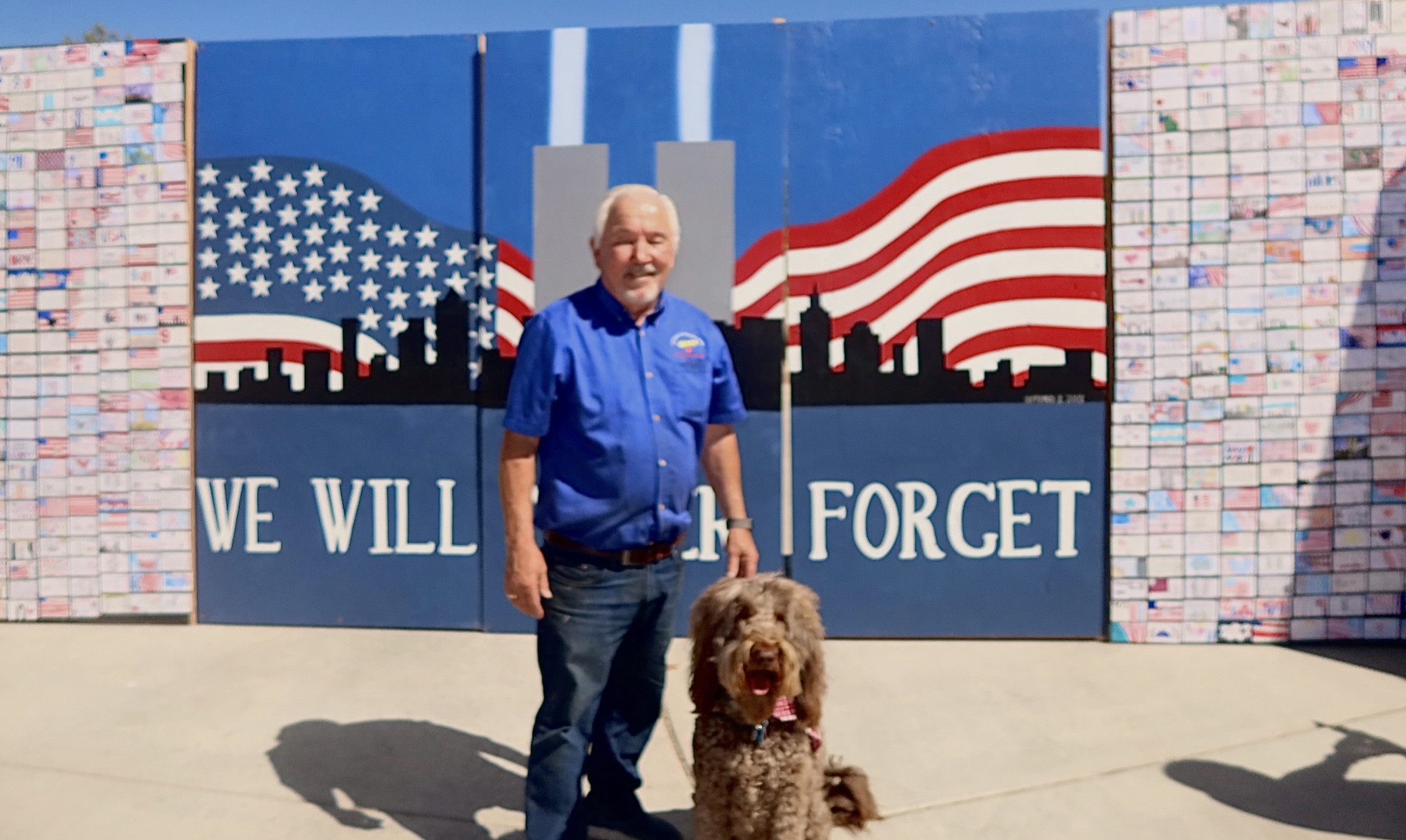 Community members beside the Las Vegas 9/11 Remembrance Wall