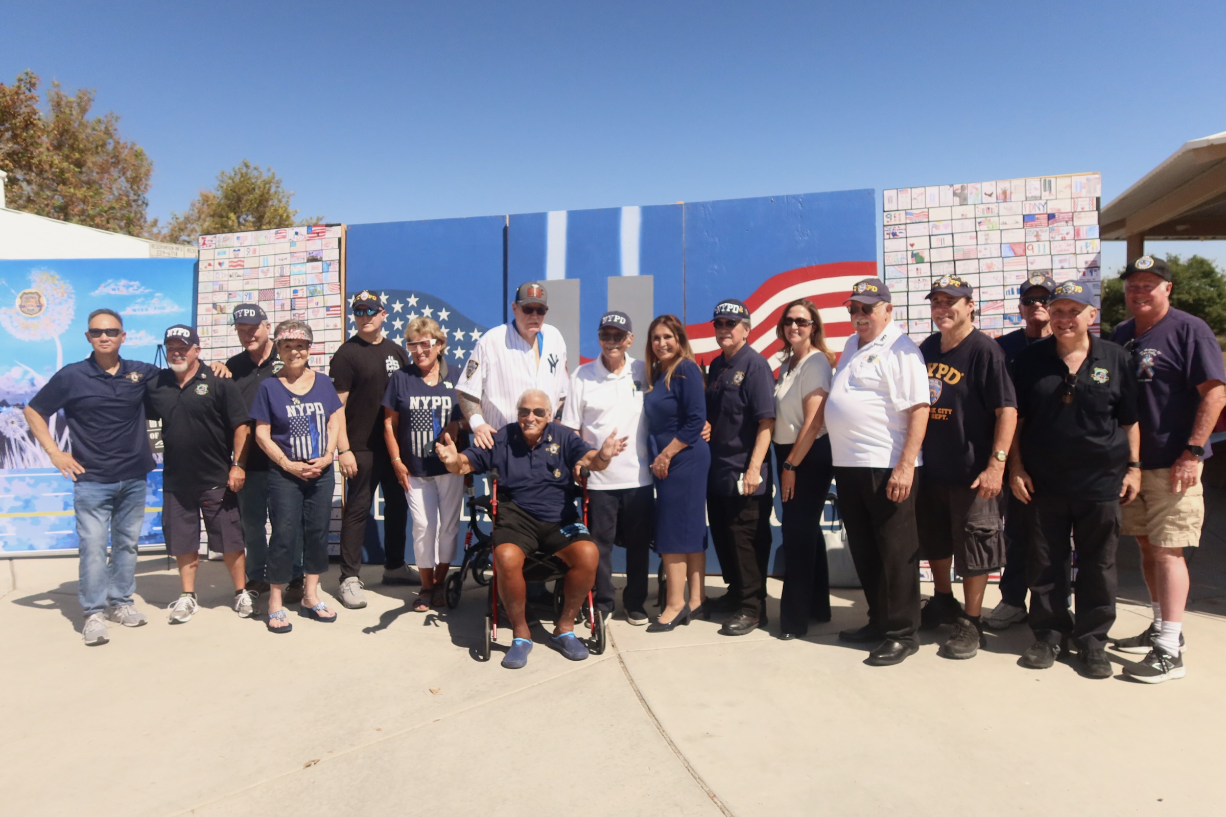 Aiyana Castro with guests at the 9/11 Remembrance Wall