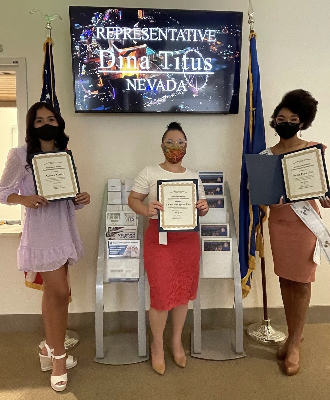 Aiyana Castro receiving special congressional recognition at Representative Dina Titus's Nevada office