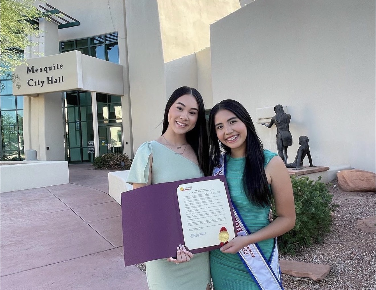 Aiyana Castro and Kailena Needham holding the City of Mesquite Be BRAVE Day proclamation