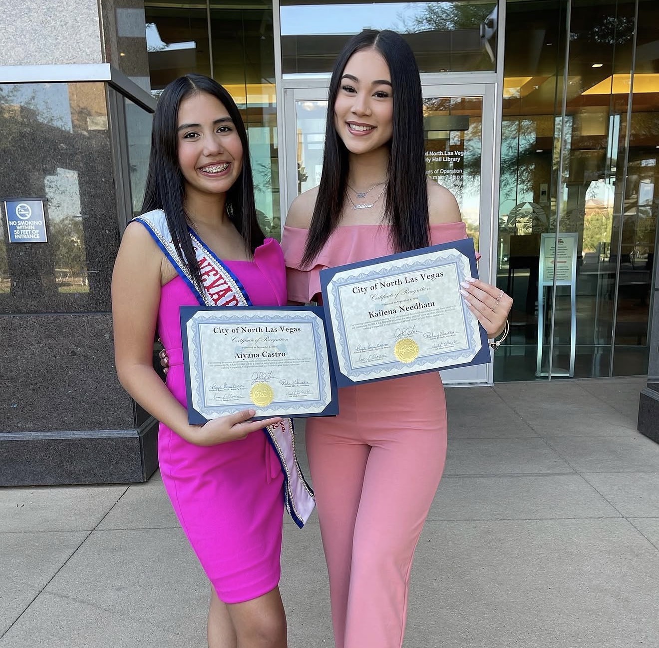 Aiyana Castro and Kailena Needham holding City of North Las Vegas certificates for Be BRAVE Day